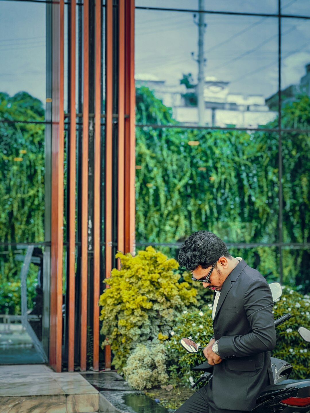 Business professional reading on a tablet outdoors